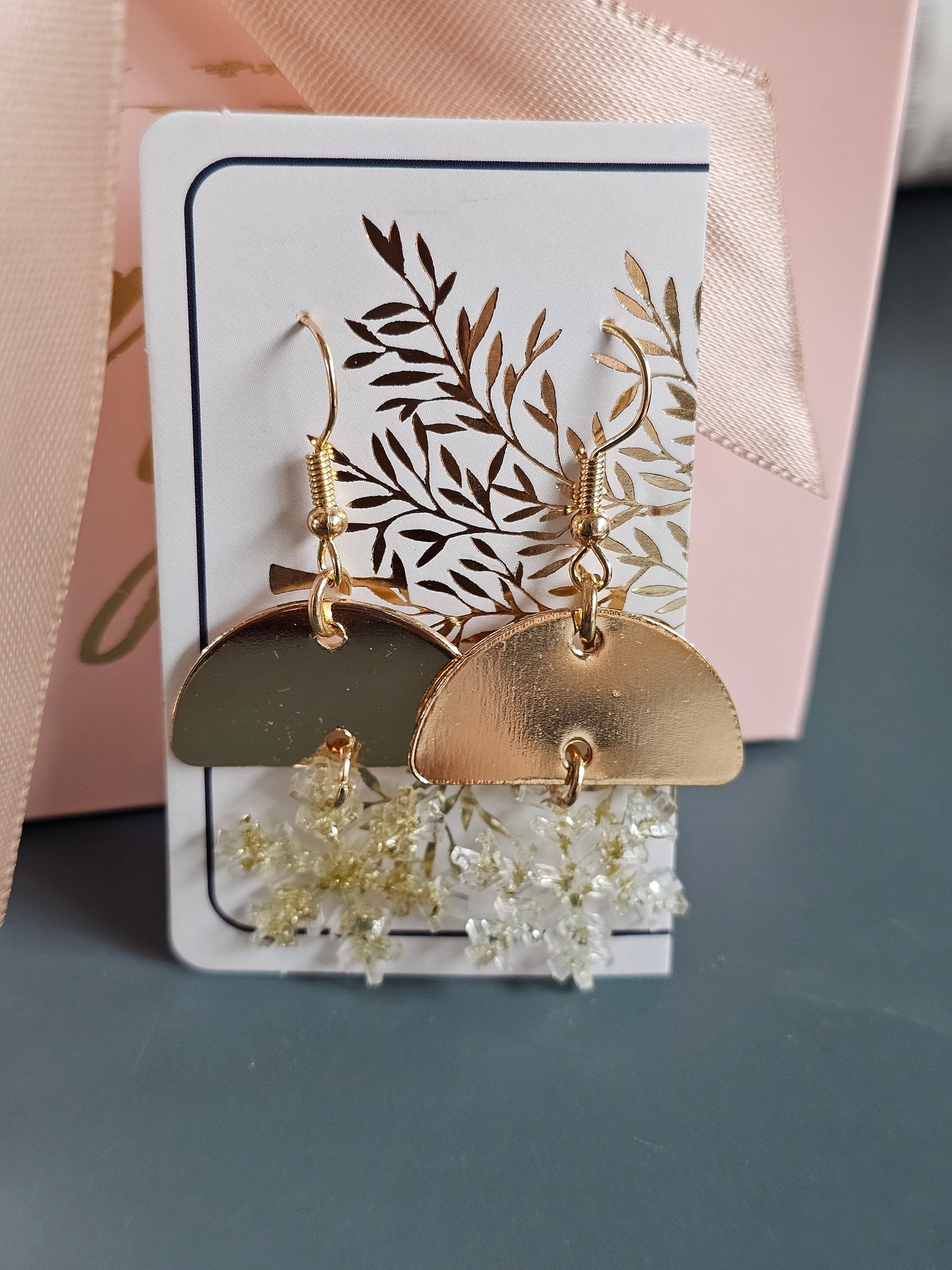 Hand-made snowflakes earringsThese one-of-a-kind hand-crafted snowflake earrings are our exclusive design. Add a touch of individuality and sophistication to your collection with these stunning white earrings. All our designs are made with a high-quality