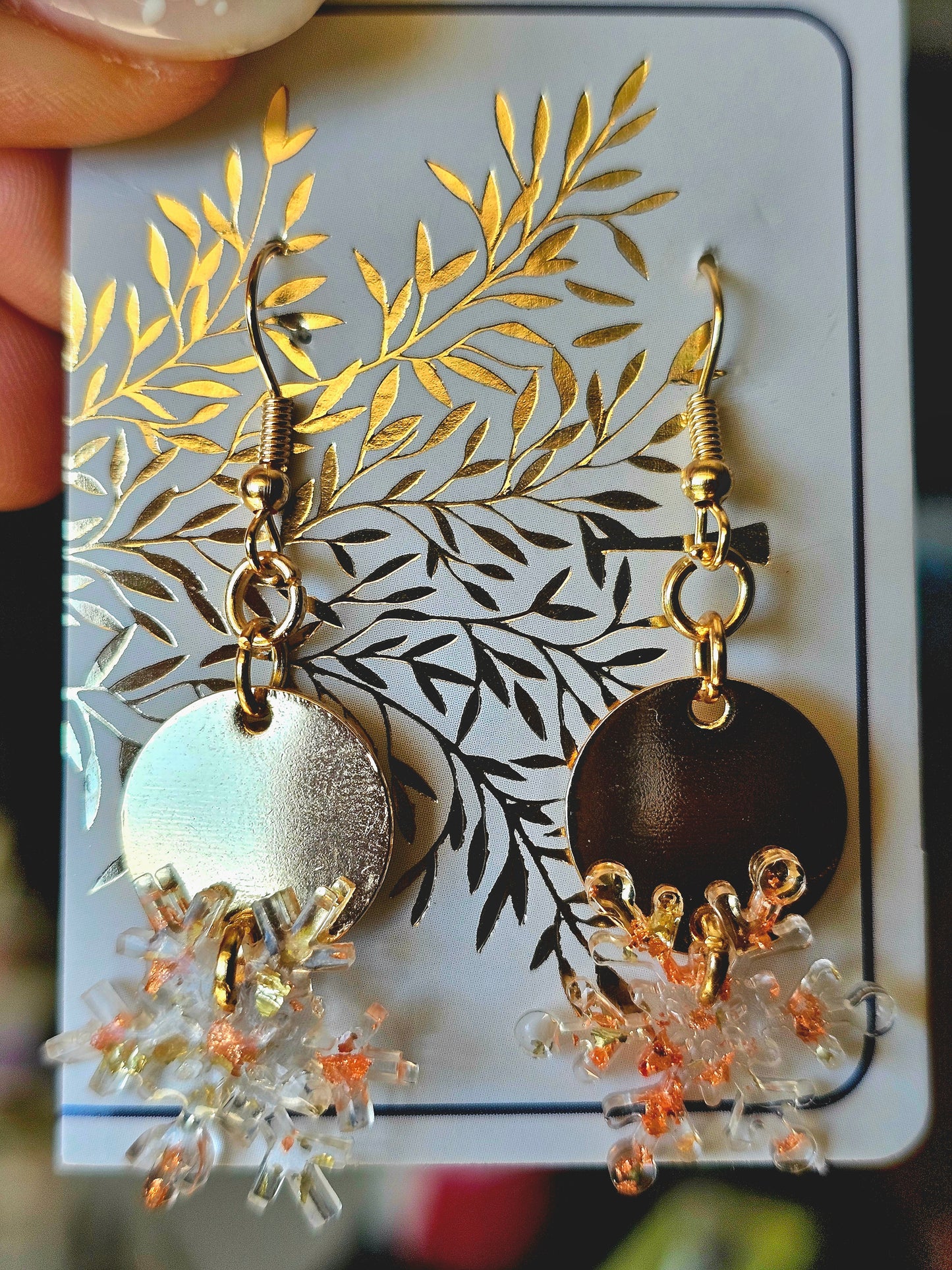 Hand-made snowflakes earringsThese one-of-a-kind hand-crafted snowflake earrings are our exclusive design. Add a touch of individuality and sophistication to your collection with these stunning white earrings. All our designs are made with a high-quality
