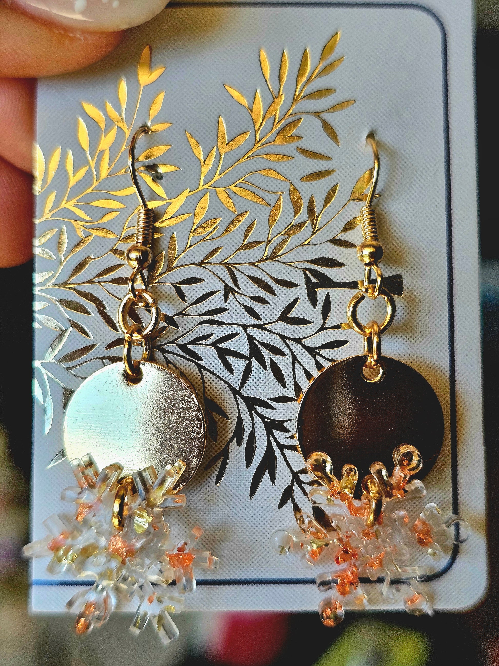 Hand-made snowflakes earringsThese one-of-a-kind hand-crafted snowflake earrings are our exclusive design. Add a touch of individuality and sophistication to your collection with these stunning white earrings. All our designs are made with a high-quality