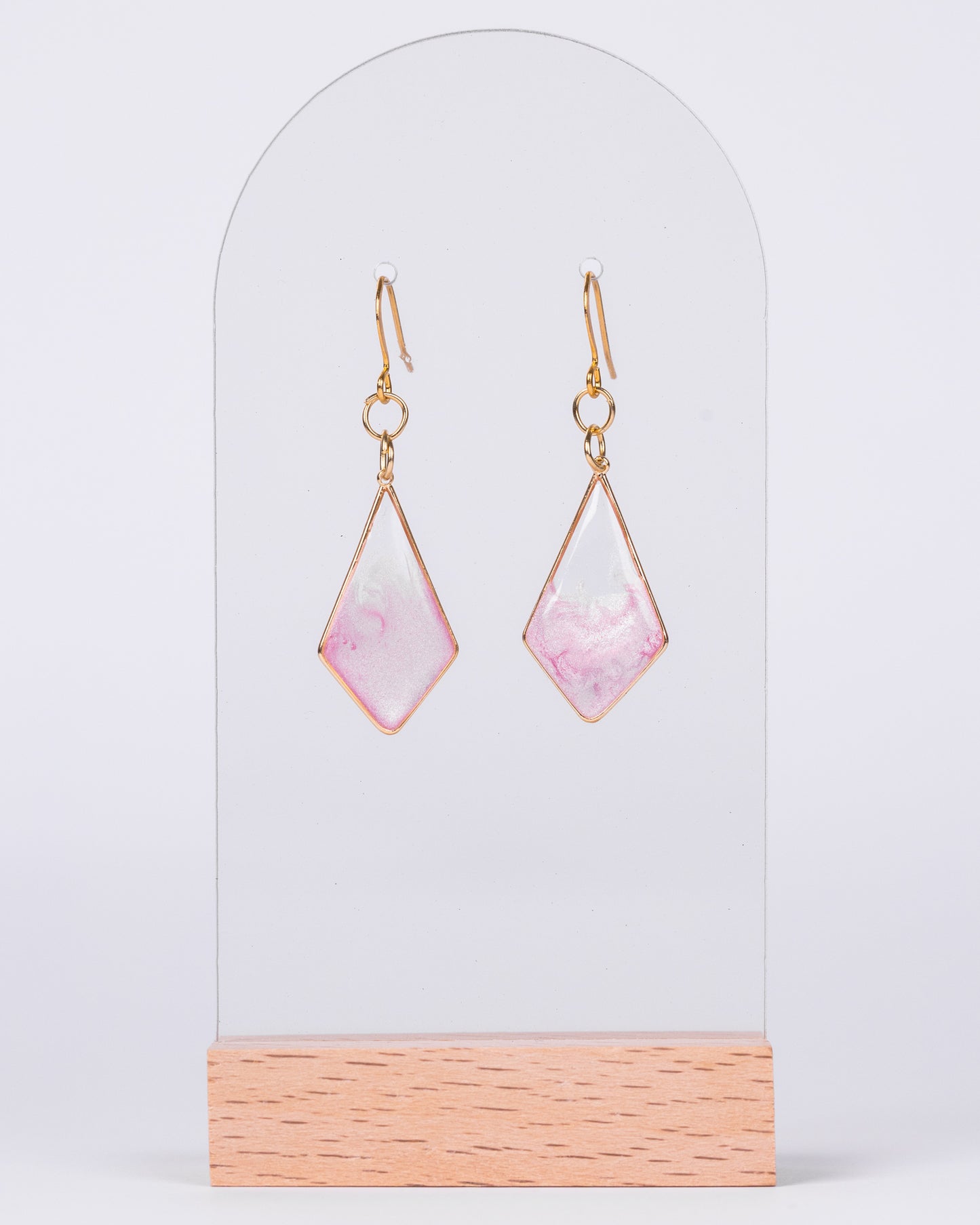 Handmade gold-plated diamond earrings with real pink flowers and gold flakes in clear resin – elegant floral jewellery from Australia.