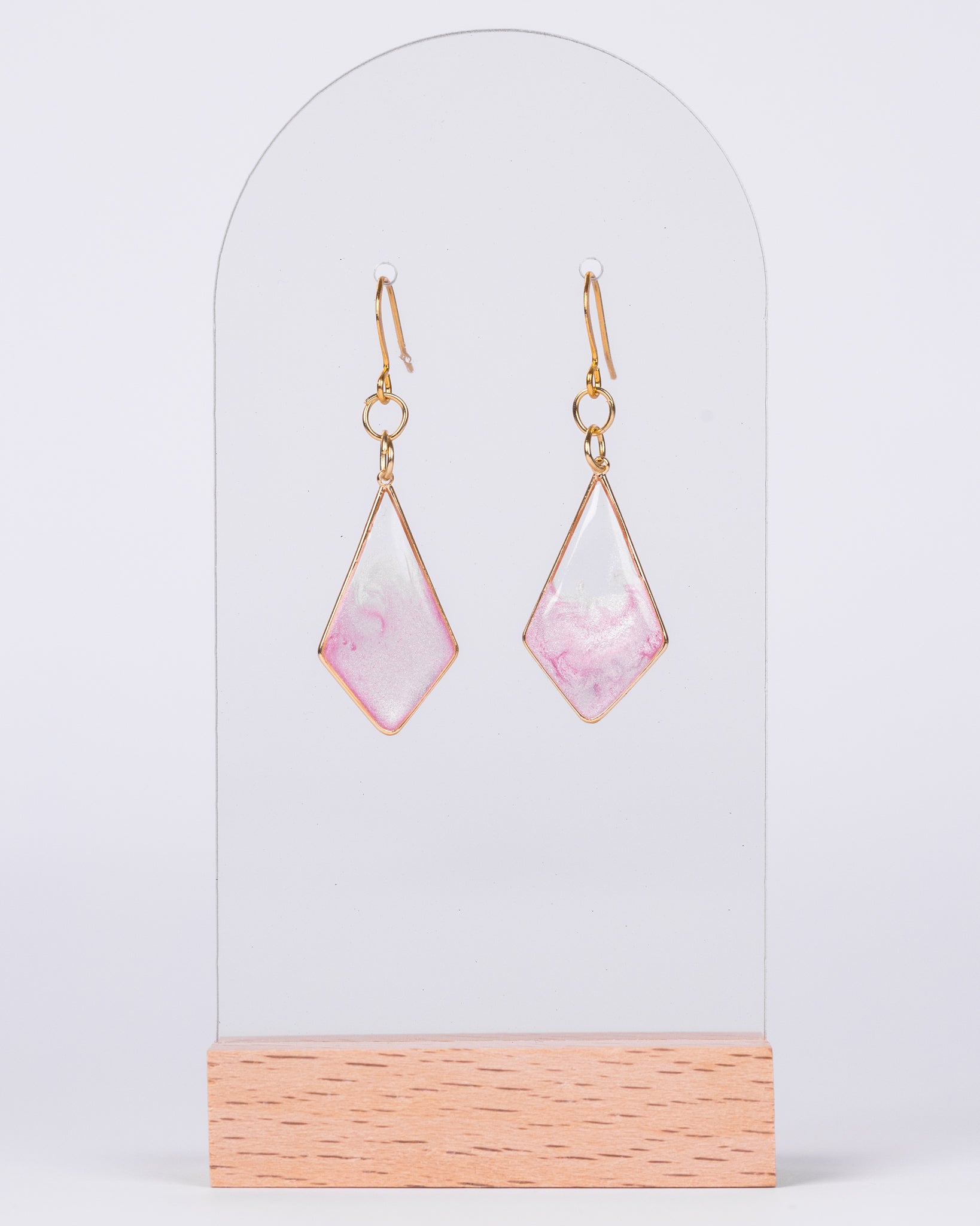 Handmade gold-plated diamond earrings with real pink flowers and gold flakes in clear resin – elegant floral jewellery from Australia.