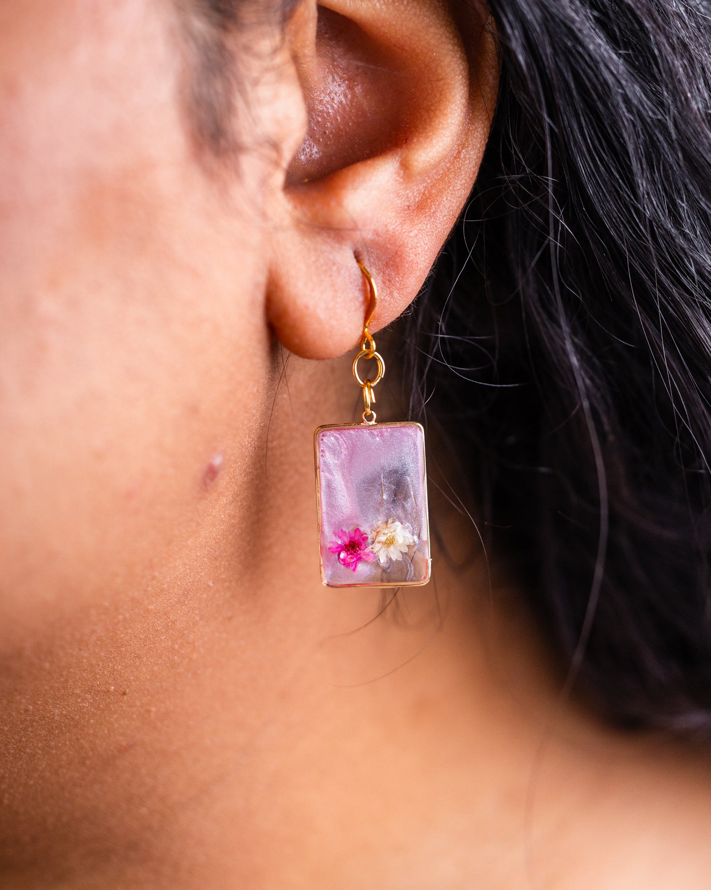 Handmade gold-plated pink and clear earrings with genuine flowers