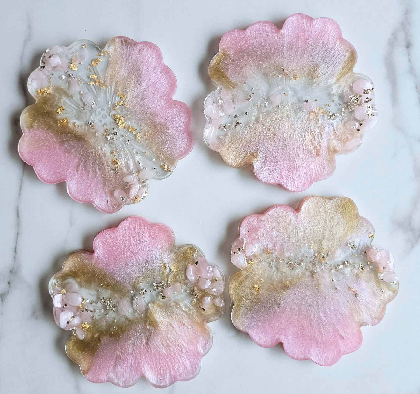 Personalised hand-made baby pink resin coasters with pink and clear crystalsThis gorgeous set of flower coasters will add a unique touch of elegance and beauty to every home décor. The unique colour combination that this set possess with the added pink an