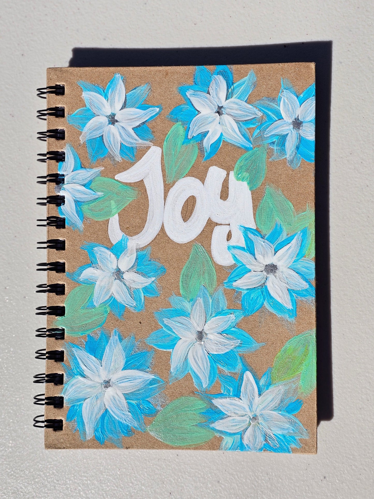 Personalised hand-painted floral journal with baby blue flowers