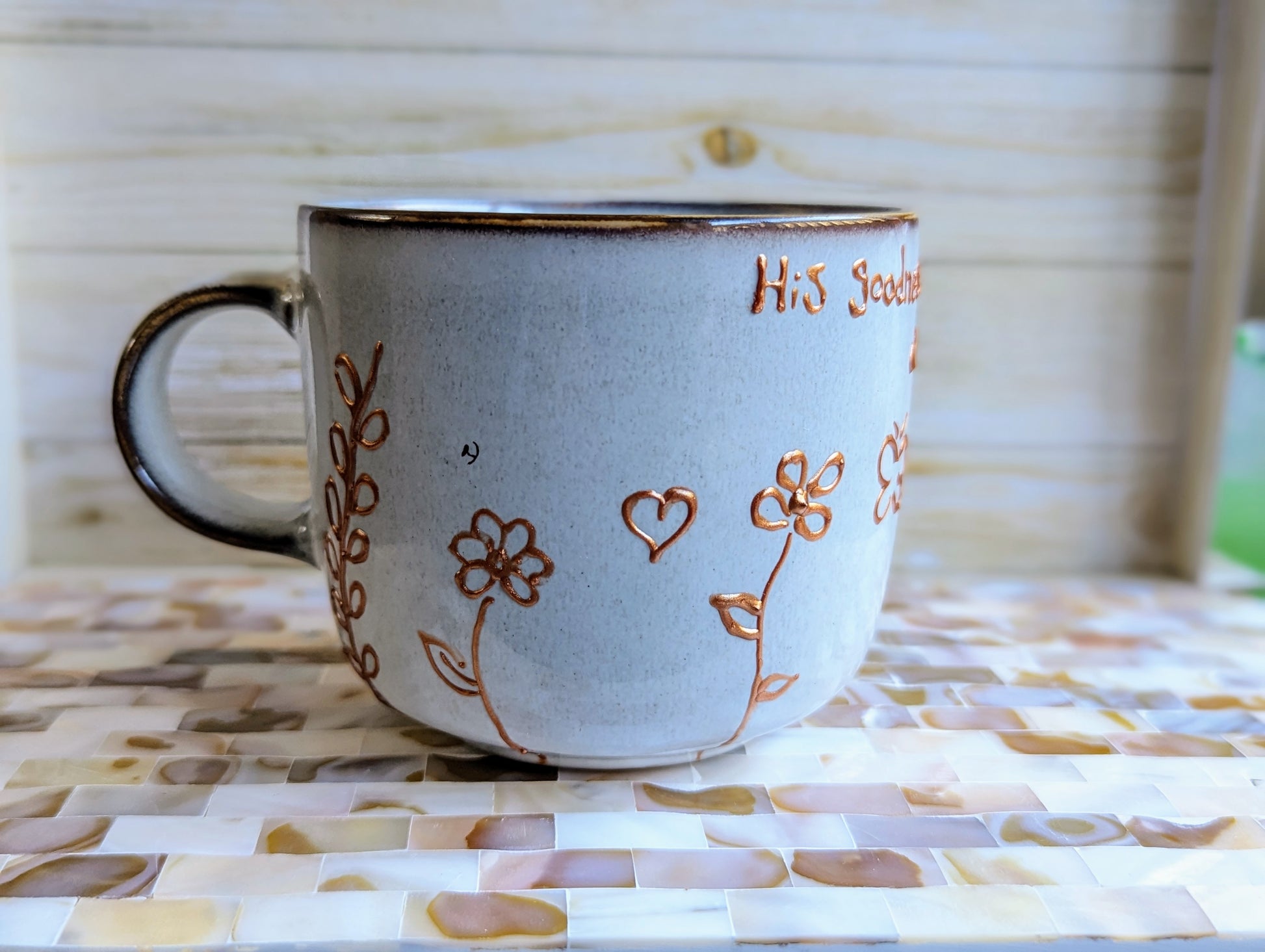 Personalised hand-painted dancing flowers mug. (Ps 23:6) Surely goodness and mercy shall follow me All the days of my life;Enjoy the beauty of nature and artistry with our vibrant and full-of-life hand-painted stoneware mug. This mug is adorned with a stu