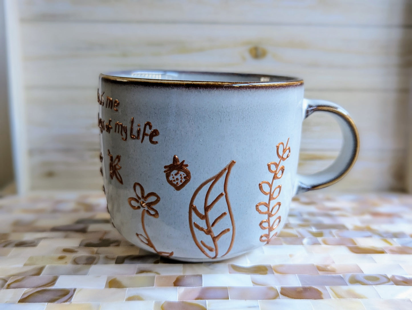 Personalised hand-painted dancing flowers mug. (Ps 23:6) Surely goodness and mercy shall follow me All the days of my life;Enjoy the beauty of nature and artistry with our vibrant and full-of-life hand-painted stoneware mug. This mug is adorned with a stu