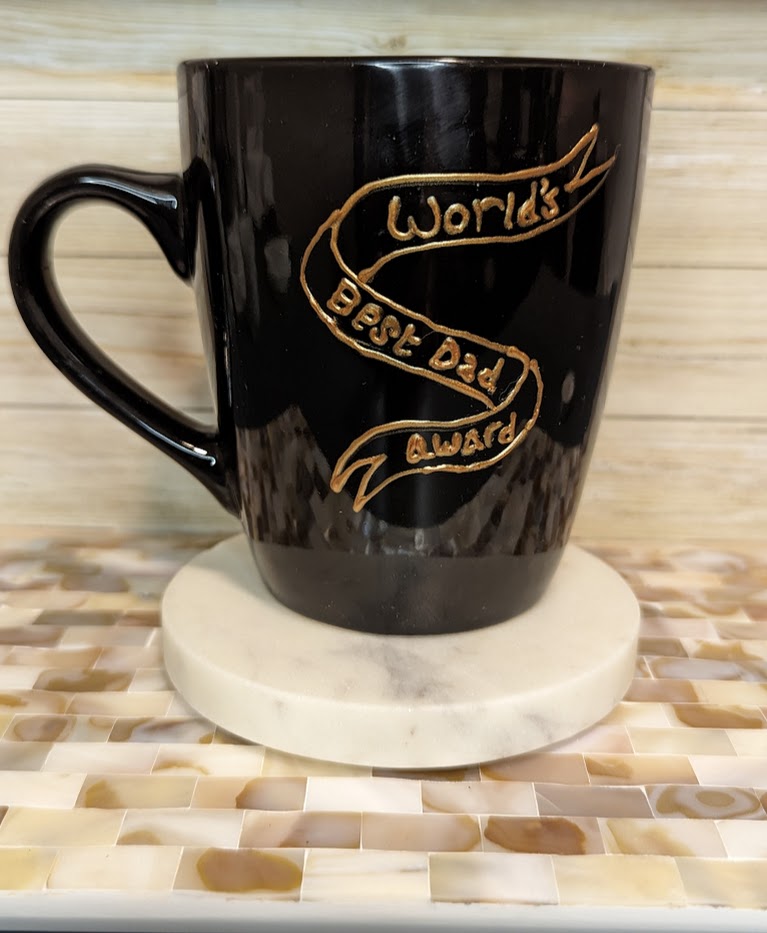 Personalised hand-painted stoneware black mug. World's best dad. Father's Day mugThis personalised stoneware black mug is the perfect gift to show your appreciation to your dad. Whether it is a birthday, Christmas or Father`s day gift, It will surely put