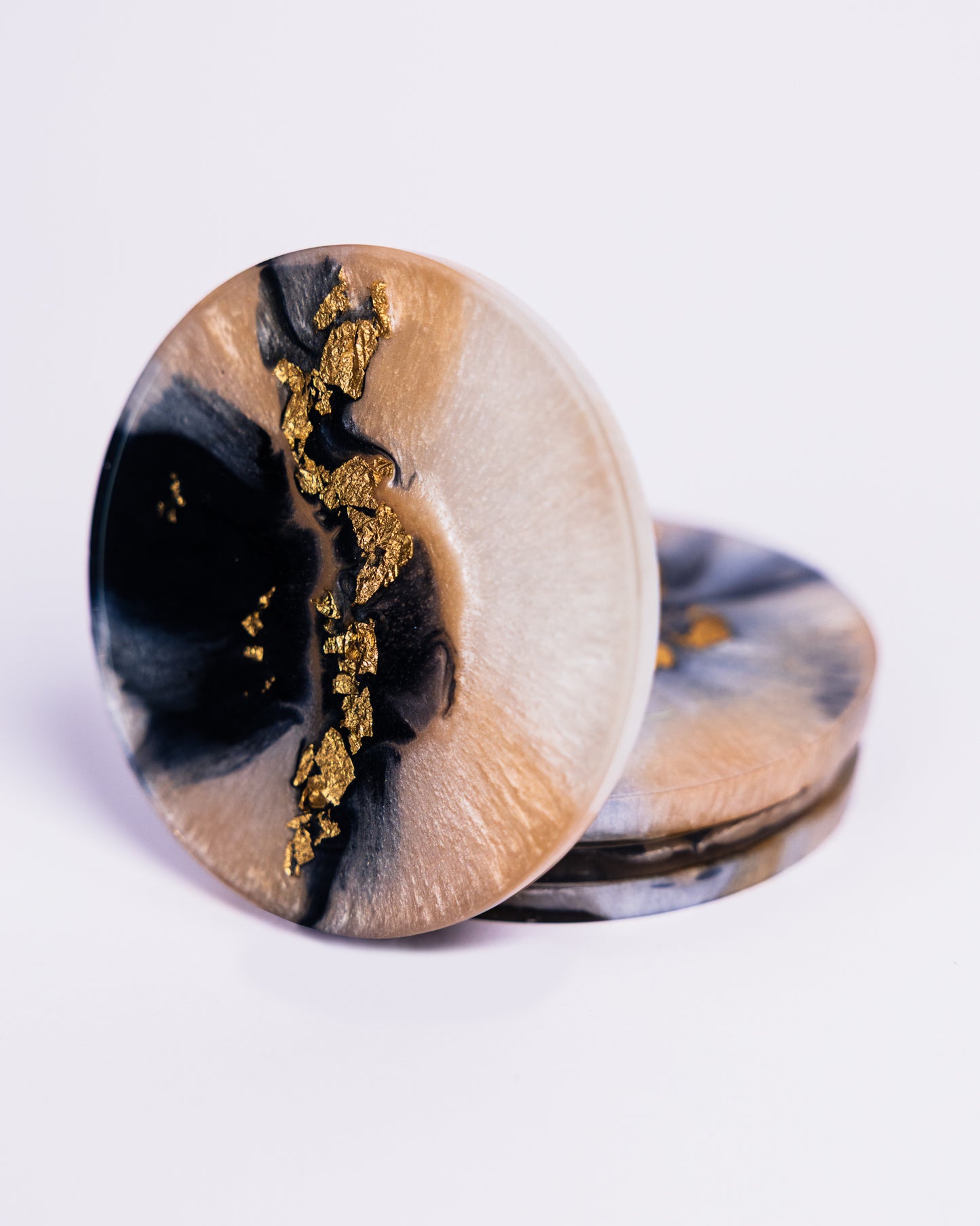 `Personalised beige and black resin coasters with gold flakes